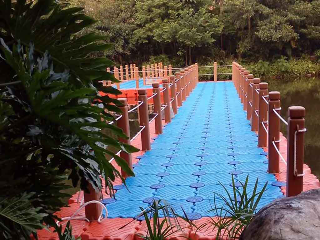 guardrail-compliance-walkway ADA-compliant handrails with anti-glare finish and tamper-proof fasteners on public floating bridge