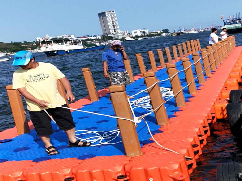 pontoon-bridge-snaplock-connections Military-grade snap connectors joining HDPE pontoons for floating bridge assembly