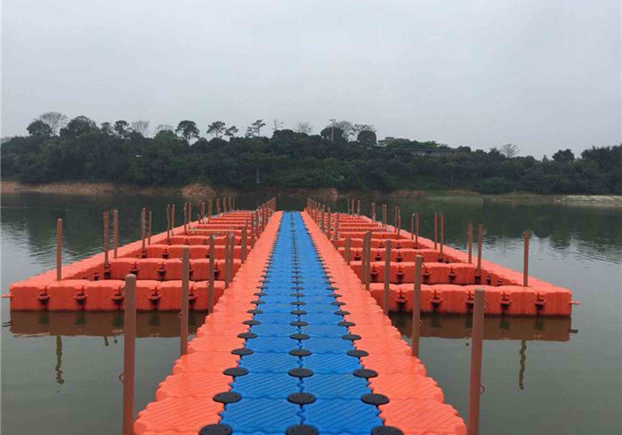 floating fish farming platform with high-density polyethylene (HDPE) cages in open ocean