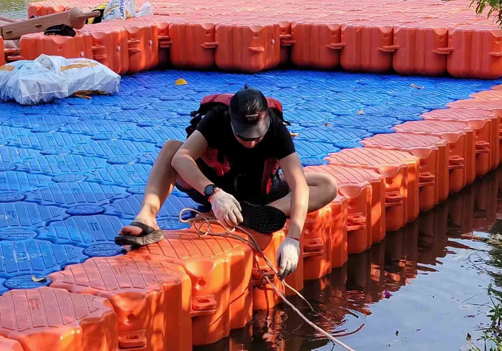 Modular expandable dock system with custom L-shape configuration and color-matched accessories