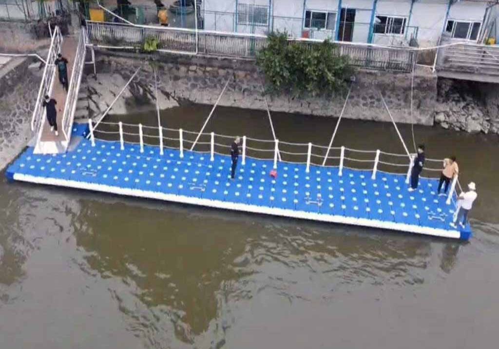 Luxury private dock with infinity-edge design at a villa shoreline