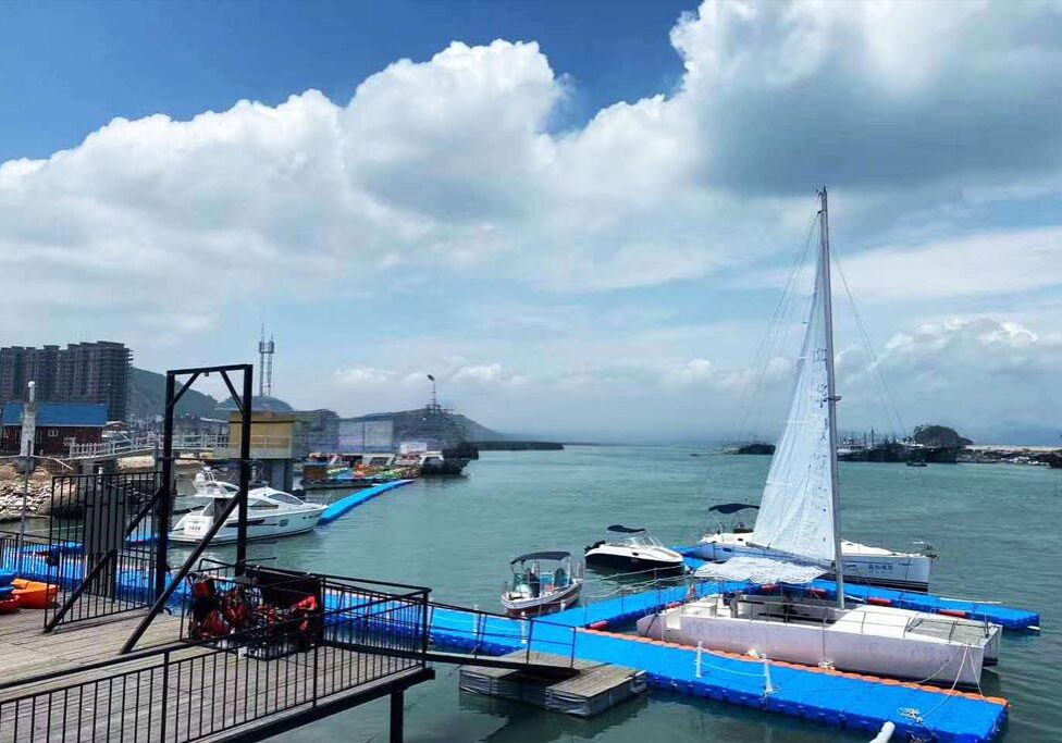 Commercial-grade floating boat dock system for cargo ships and luxury yachts in open water conditions