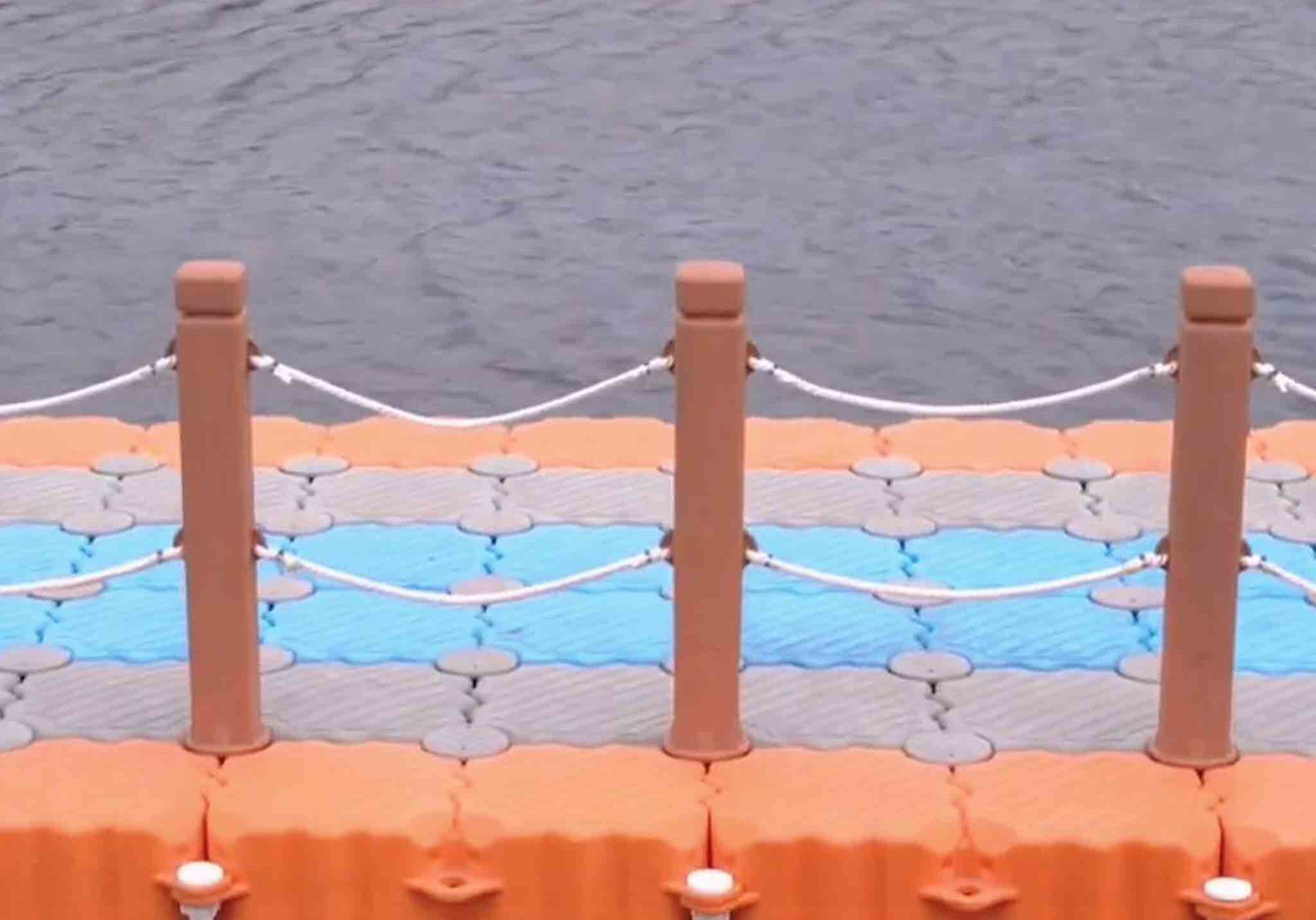 modular-dock-with-safe-hand-rails heavy-duty floating boat dock in extreme marine environment
