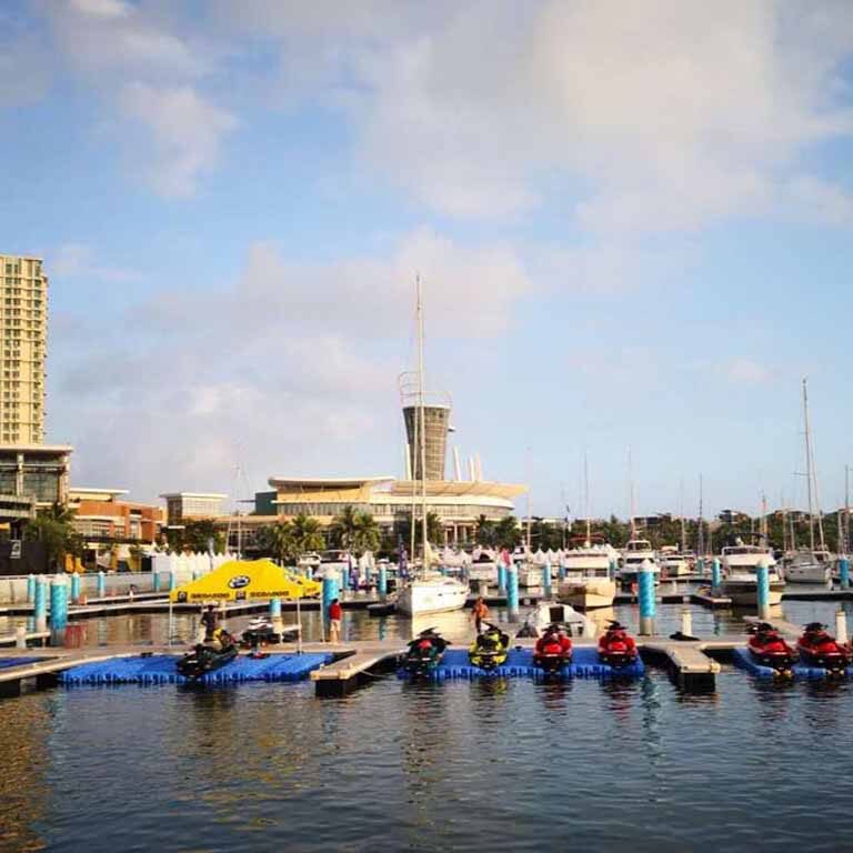 Private jet ski floating dock with integrated charging and security monitoring